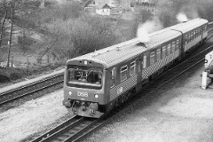 DSB MR 4001 photographed at the railwaystation in Fredericia October 1978.  The MR class was purchased from 1978 to 1985 in a number of 98. The first 30 were built by Uerdingen in Germany, the rest by Scandia in Denmark. Dieselhydraulic Deutz engine. 325 hp. Max speed 120 km/h - 75 mph. Length each unit 22 335 mm. Weight 34,5 metric tonnes. One trainset consists of two units. In 1995 - 1997 renovated and painted in a white/red colourscheme. Increased max. speed to 130 km/h - 81 mph.